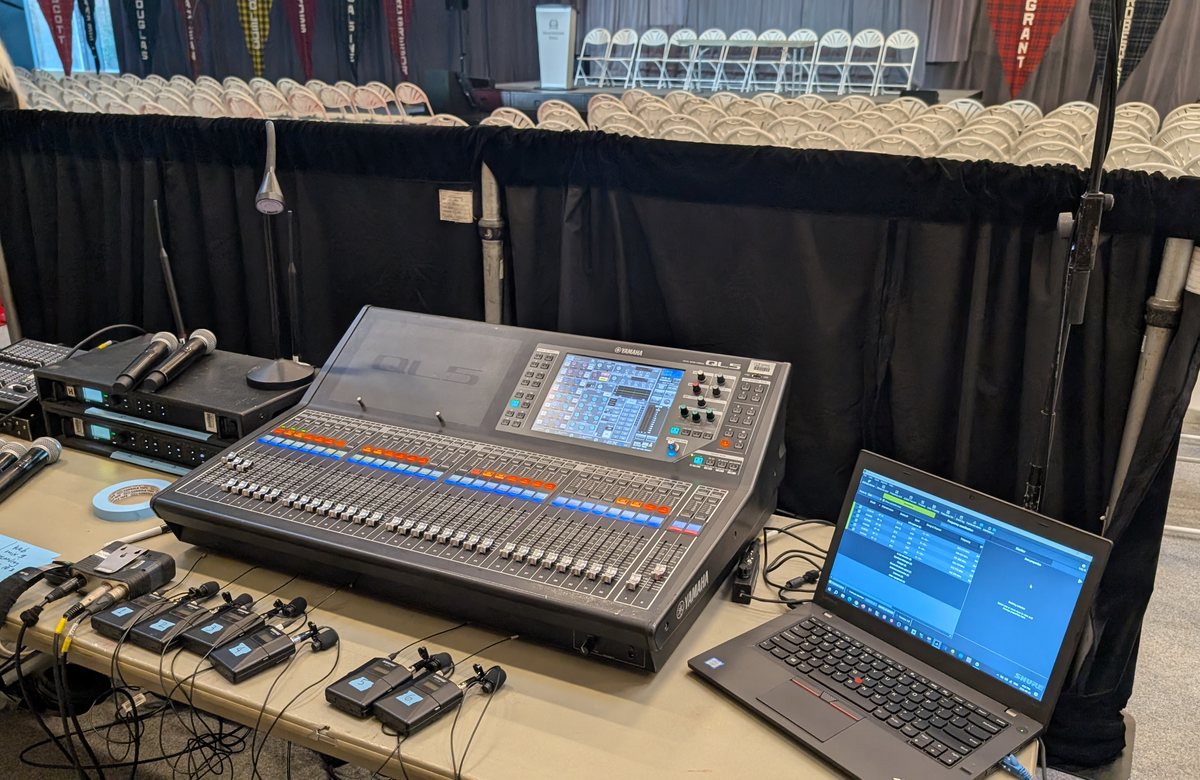 Audio console and laptop position in a corporate breakout room
